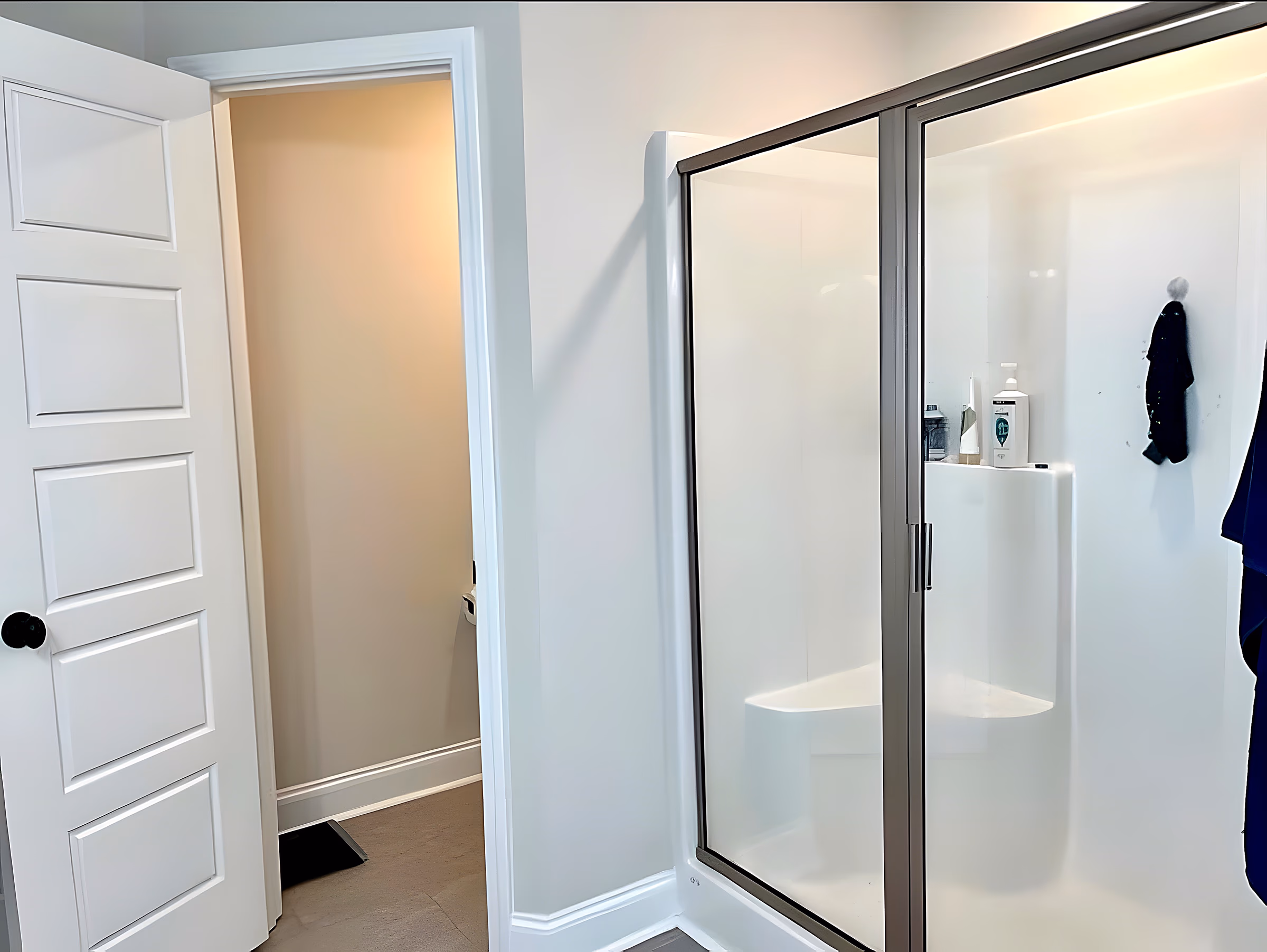Walk-in glass shower in secondary bathroom