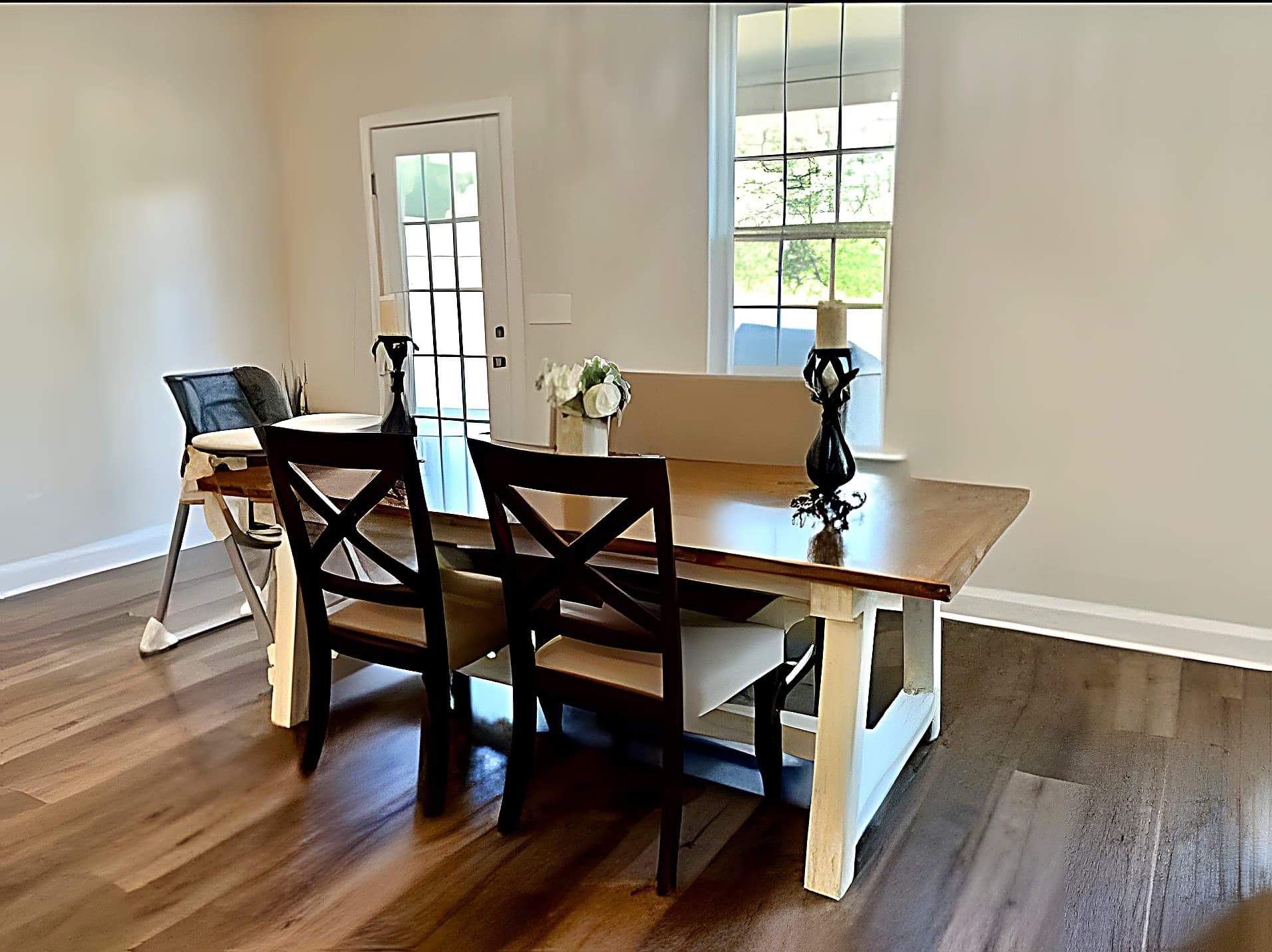 Dining area with live-edge table and french door to the back patio